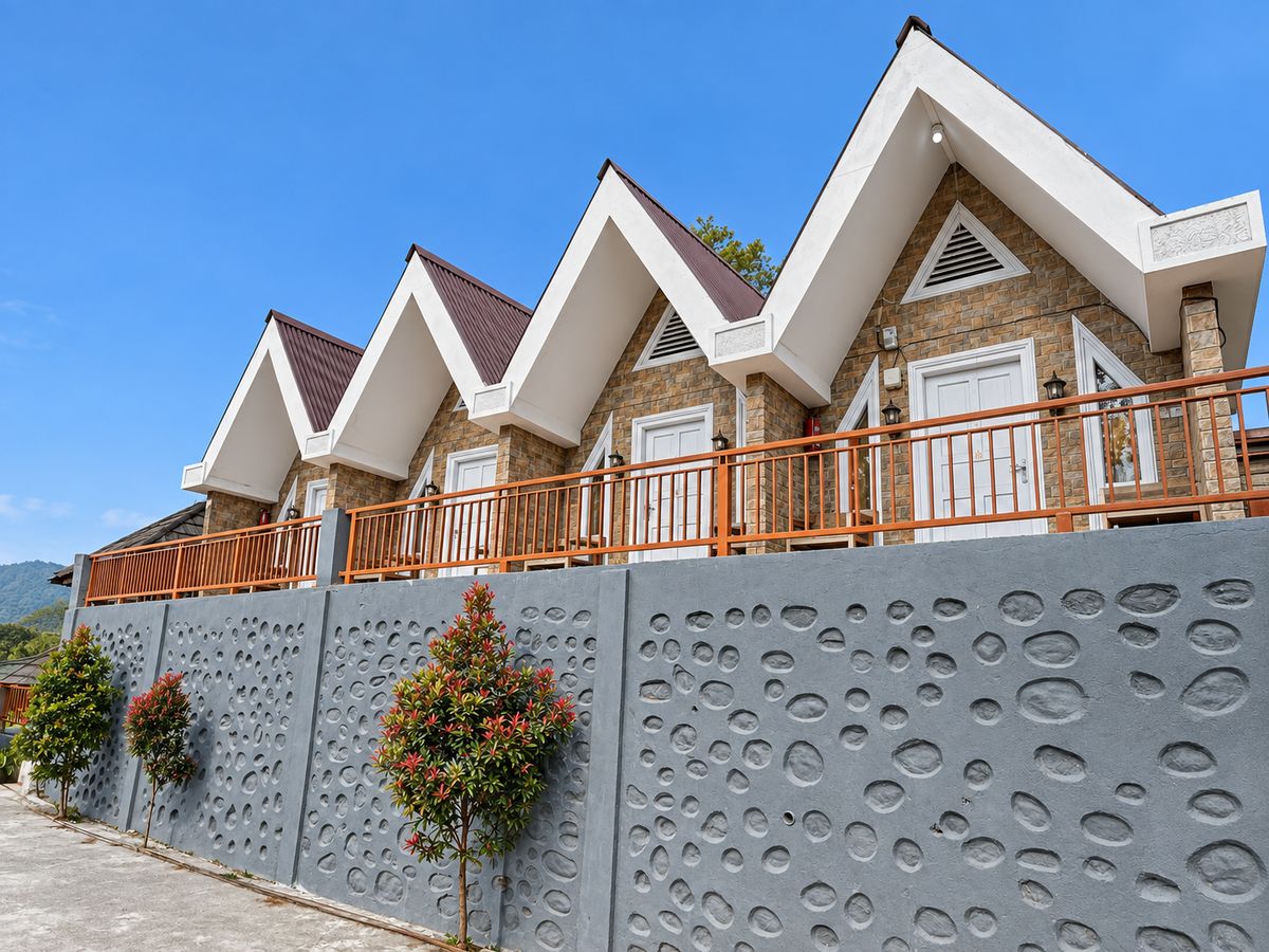 A row of pointed-roof Villa Kurcaci gnome houses at D'Pines Peak Villa Malino
